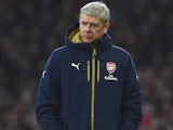 Arsene Wenger wraps up warm during the game between Arsenal and Newcastle on January 2, 2016