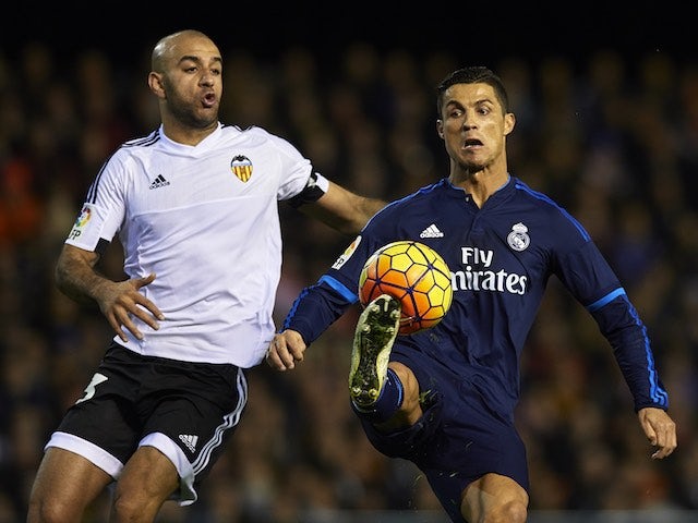 Aymen Abdennour and Cristiano Ronaldo in action during the game between Valencia and Real Madrid on January 3, 2016