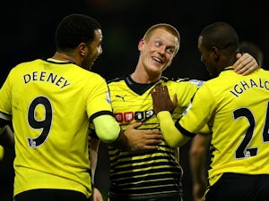 Ben Watson celebrates with Troy Deeney and Odion Ighalo during the game between Watford and Man City on January 2, 2016