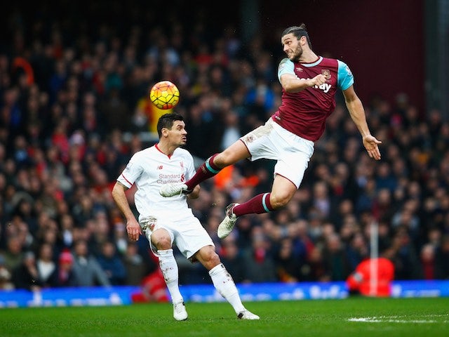 Dejan Lovren and big Andy Carroll in action during the game between West Ham and Liverpool on January 2, 2016