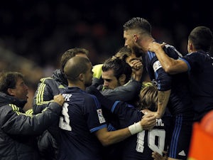 Valencia hold 10-man Real Madrid