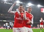 Laurent Koscielny celebrates with Aaron Ramsey during the game between Arsenal and Newcastle on January 2, 2016