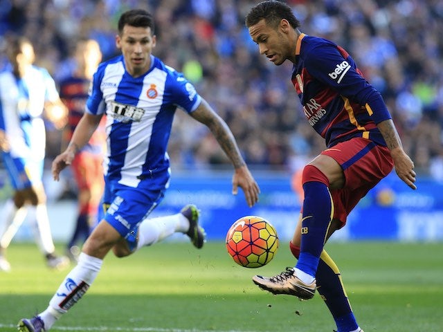 Neymar and Hernan Perez in action during the game between Espanyol and Barcelona on January 2, 2016