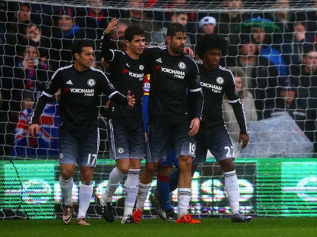 Oscar celebrates with teammates after scoring during the game between Crystal Palace and Chelsea on January 3, 2016)