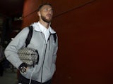 Sergio Ramos clutches a fetching washbag as he arrives for the game between Valencia and Real Madrid on January 3, 2016