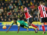Victor Wanyama brings down Dieumerci Mbokani during the game between Norwich and Southampton on January 2, 2016