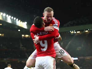 Rooney hails "massive" Liverpool scalp