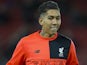Roberto Firmino warms up ahead of the Premier League game between Liverpool and Manchester City on December 31, 2016