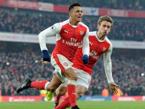 Sanchez double gives Arsenal hard-fought win