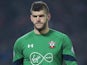 Fraser Forster in action during the EFL Cup semi-final between Liverpool and Southampton on January 25, 2017