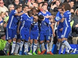 Eden Hazard is mobbed by teammates after scoring during the Premier League game between Chelsea and Arsenal on February 4, 2017