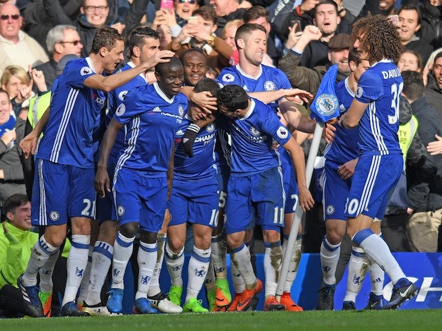 Eden Hazard is mobbed by teammates after scoring during the Premier League game between Chelsea and Arsenal on February 4, 2017