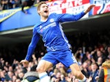 Marcos Alonso celebrates his opener during the Premier League game between Chelsea and Arsenal on February 4, 2017