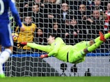 Thibaut Courtois pulls off a fingertip save during the Premier League game between Chelsea and Arsenal on February 4, 2017