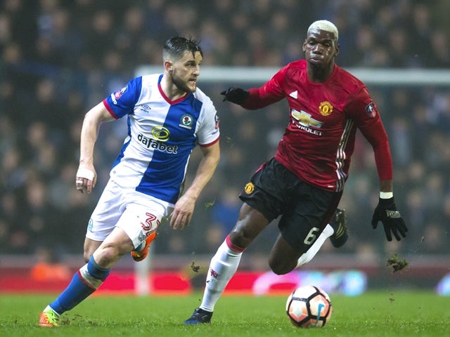 Manchester United's Paul Pogba and Blackburn Rovers' Craig Conway during the FA Cup fifth-round match on February 19, 2017
