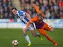 Manchester City's Kevin De Bruyne and Huddersfield Town's Dean Whitehead during the FA Cup fifth-round match on February 18, 2017