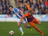 Manchester City's Kevin De Bruyne and Huddersfield Town's Dean Whitehead during the FA Cup fifth-round match on February 18, 2017