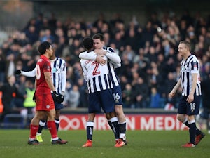 Shaun Cummings celebrates scoring for Millwall against Leicester City on February 18, 2017