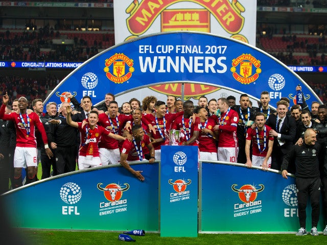 Manchester United players celebrate their EFL Cup final success over Southampton at Wembley on February 26, 2017