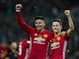 Manchester United duo Marcos Rojo and Ander Herrera celebrate after their EFL Cup final win over Southampton at Wembley on February 26, 2017