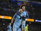 Sergio Aguero celebrates with Leroy Sane after scoring a penalty during the FA Cup replay between Manchester City and Huddersfield Town on March 1, 2017