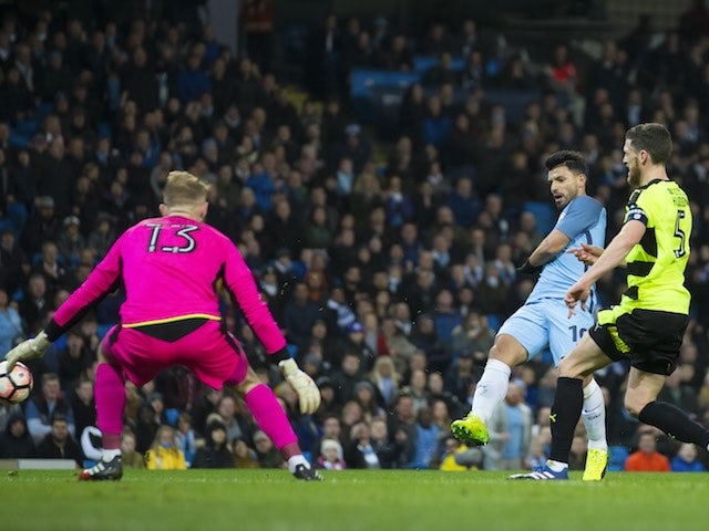Sergio Aguero scores during the FA Cup replay between Manchester City and Huddersfield Town on March 1, 2017