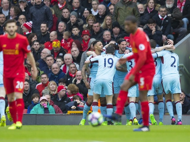 Ashley Barnes celebrates with teammates after taking the lead during the Premier League game between Liverpool and Burnley on March 12, 2017