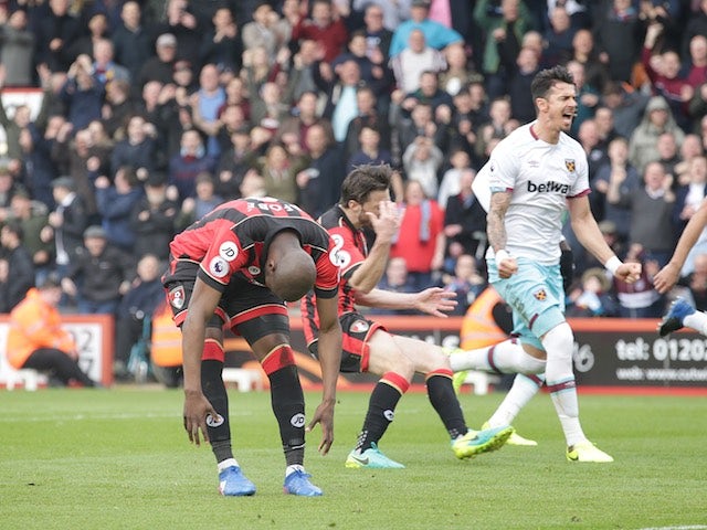 Benik Afobe reacts to having a penalty saved during the Premier League game between Bournemouth and West Ham United on March 11, 2017