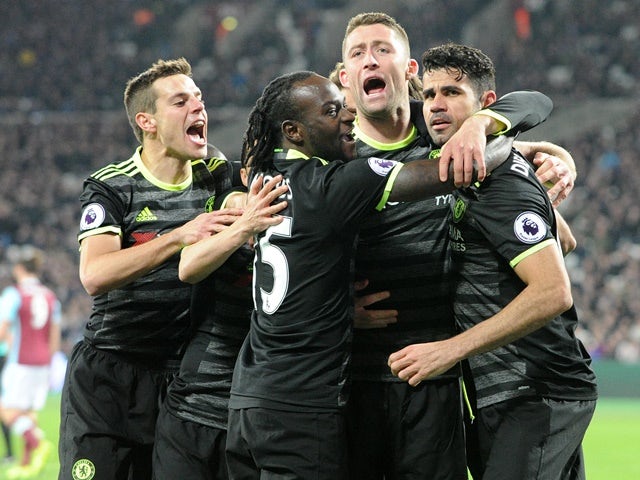Chelsea players celebrate Diego Costa's goal against West Ham United on March 6, 2017