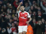 Theo Walcott celebrates opening the scoring during the Champions League game between Arsenal and Bayern Munich on March 7, 2017