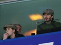David and Brooklyn Beckham watch on during the FA Cup quarter-final between Chelsea and Manchester United on March 13, 2017