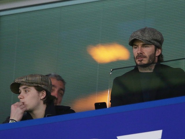 David and Brooklyn Beckham watch on during the FA Cup quarter-final between Chelsea and Manchester United on March 13, 2017