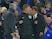Mike Jones stands between Jose Mourinho and Antonio Conte during the FA Cup quarter-final between Chelsea and Manchester United on March 13, 2017