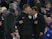 Mike Jones stands between Jose Mourinho and Antonio Conte during the FA Cup quarter-final between Chelsea and Manchester United on March 13, 2017