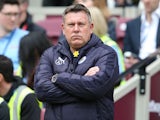 Craig Shakespeare watches on during the Premier League game between West Ham United and Leicester City on March 18, 2017