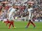 Jermain Defoe celebrates scoring with Eric Dier and Adam Lallana during the World Cup qualifier between England and Lithuania on March 26, 2017