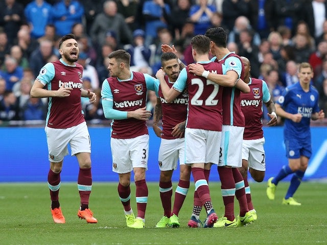 Manuel Lanzini celebrates scoring with teammates during the Premier League game between West Ham United and Leicester City on March 18, 2017