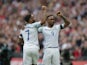 Raheem Sterling and Jermain Defoe celebrate during the World Cup qualifier between England and Lithuania on March 26, 2017