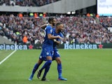 Riyad Mahrez celebrates with Danny Simpson during the Premier League game between West Ham United and Leicester City on March 18, 2017