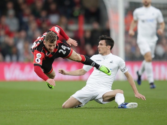 Ryan Fraser and Jack Cork in action during the Premier League game between Bournemouth and Swansea City on March 18, 2017