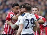 Sofiane Boufal clashes with Harry Winks during the Premier League game between Tottenham Hotspur and Southampton on March 19, 2017