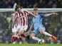 Kevin De Bruyne and Joe Allen in action on March 8, 2017