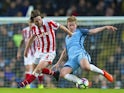 Kevin De Bruyne and Joe Allen in action on March 8, 2017