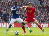 Philippe Coutinho and Idrissa Gueye in action during the Premier League game between Liverpool and Everton on April 1, 2017