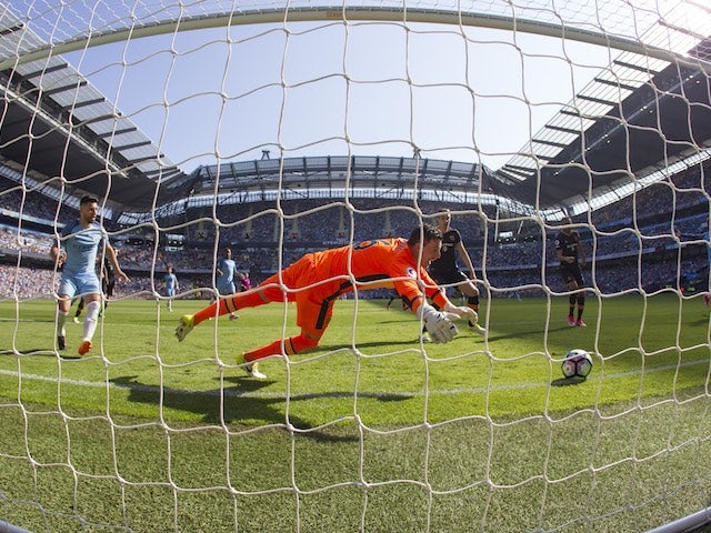 Ahmed Elmohamady scores an own goal past Eldin Jakupovic during the Premier League game between Manchester City and Hull City on April 8, 2017