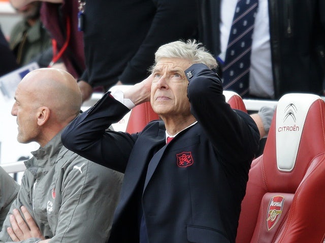 Wenger tight-lipped on exit decision