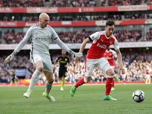 Arsenal show spirit in draw with Man City