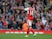 Arsenal's Theo Walcott celebrates equalising against Manchester City on April 2, 2017
