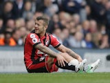 Jack Wilshere sits injured during the Premier League game between Tottenham Hotspur and Bournemouth on April 15, 2017