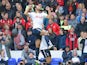 Mousa Dembele celebrates scoring during the Premier League game between Tottenham Hotspur and Bournemouth on April 15, 2017